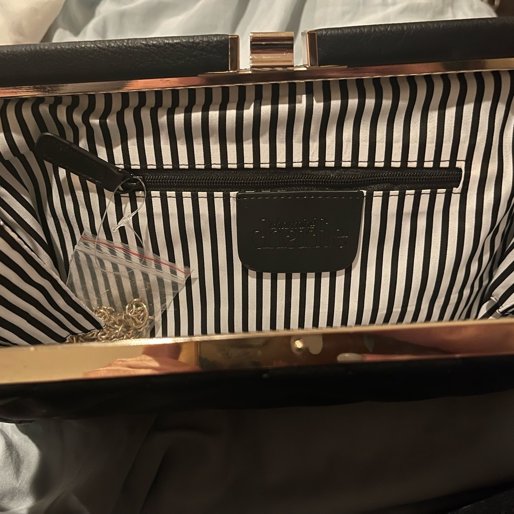 Charming Charlie black clutch